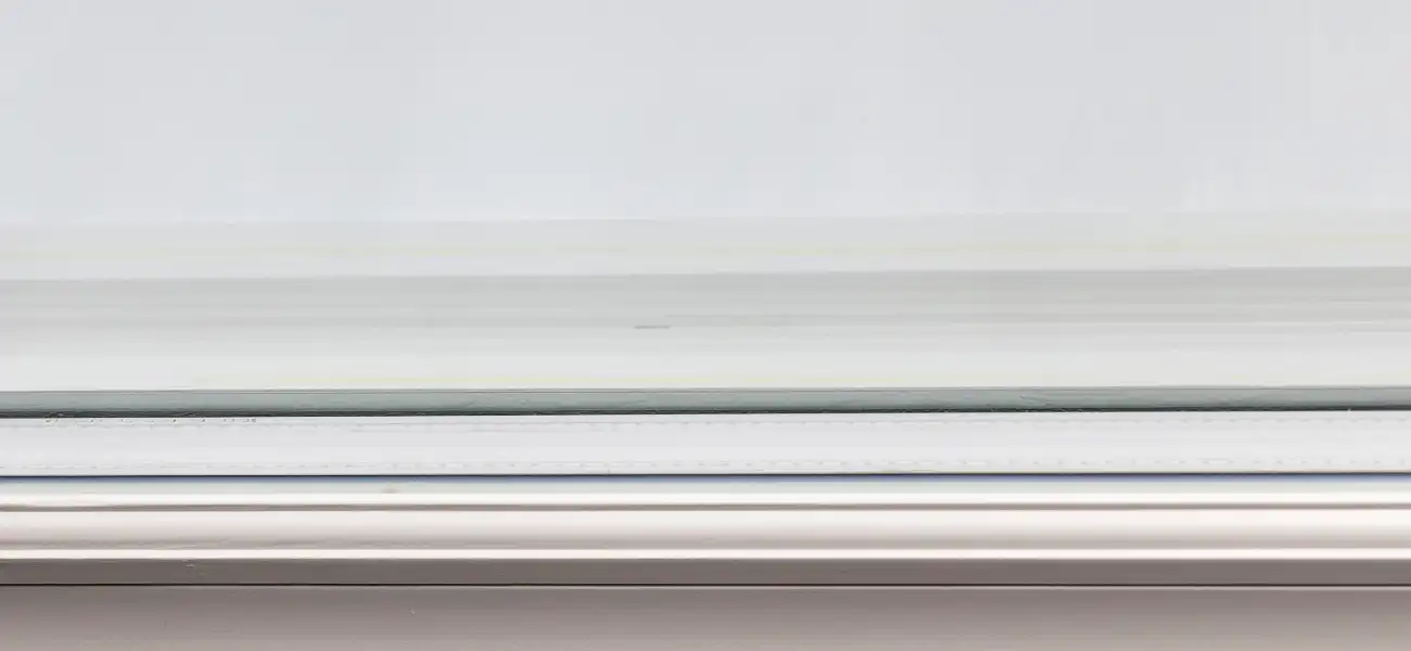 Slimline double-glazed unit and spacer bar